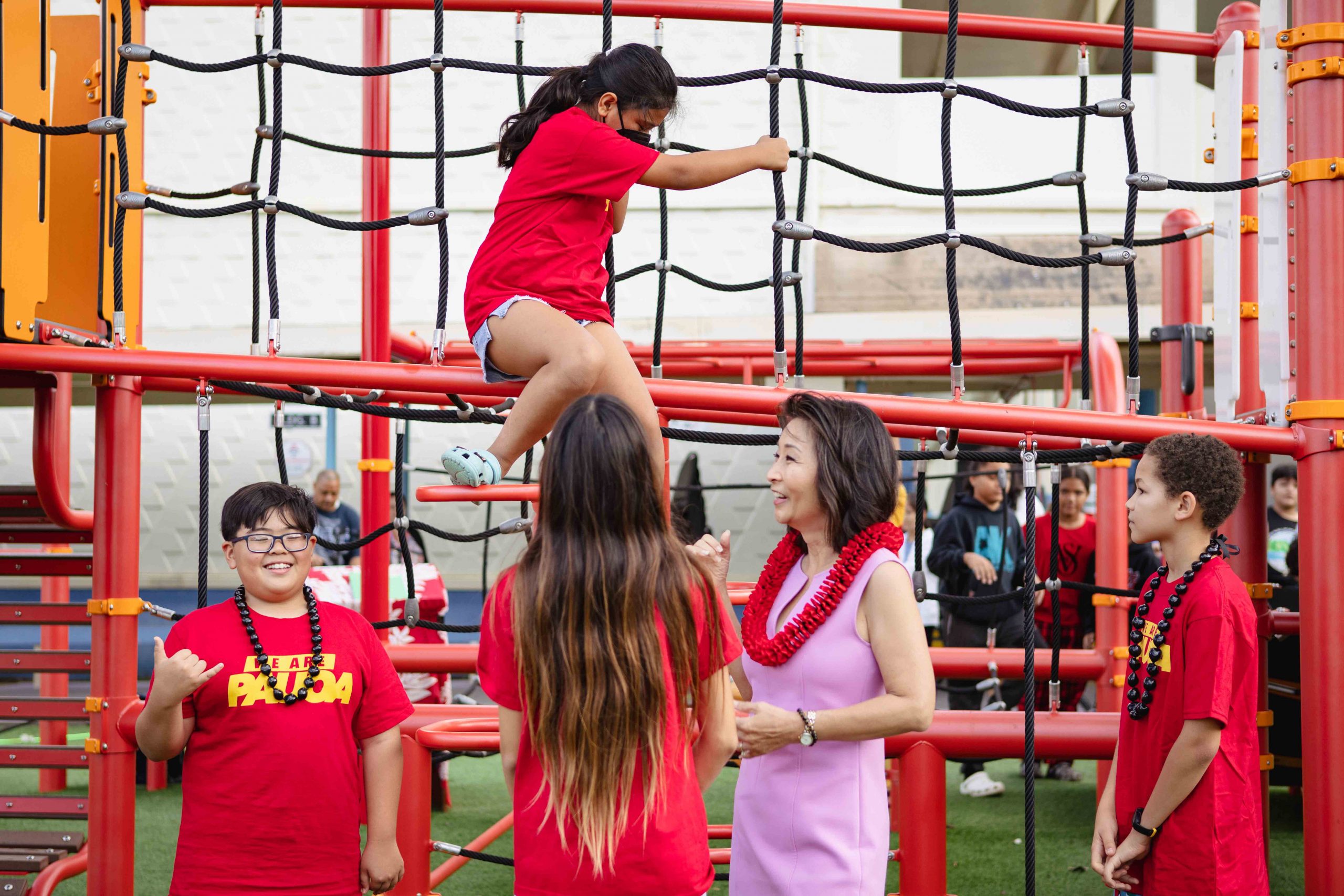 Students enjoying renovated school playground in Hawaii
